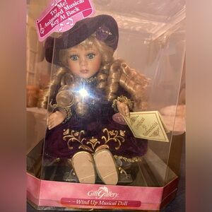 Gift Gallery wind up musical porcelain doll